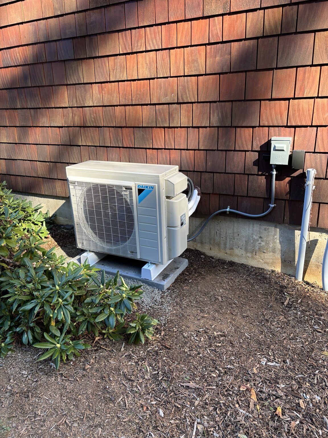 Ductless heat pump outdoor unit by Tranquility Heating and Cooling